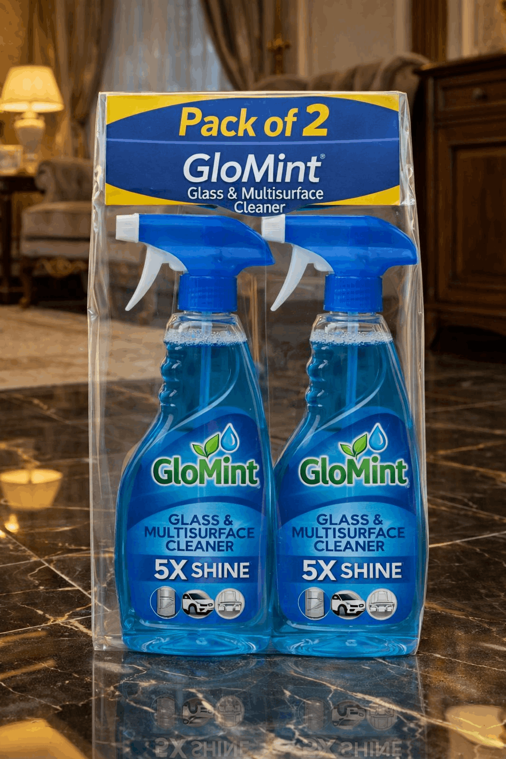 Pack of 2 GloMint glass and multisurface cleaners in a clear packaging on a marble countertop.